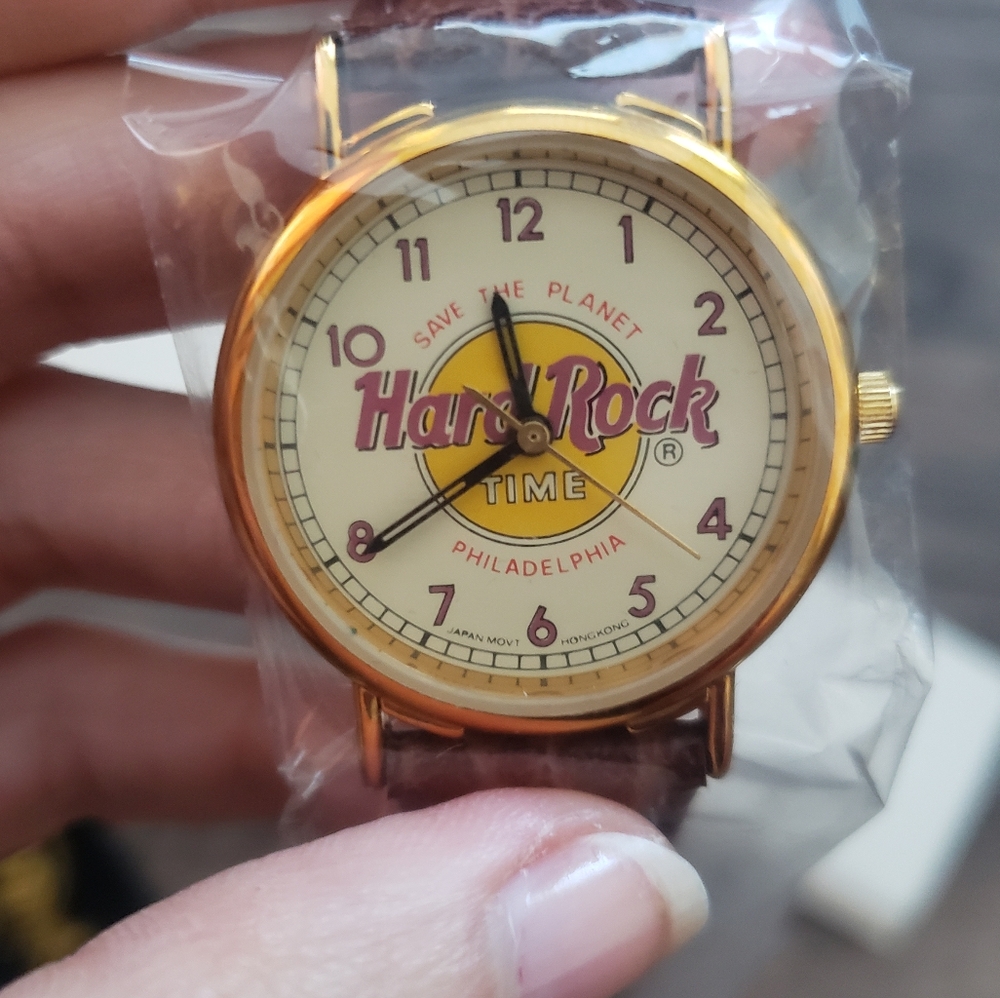 Vintage Hard Rock Save the Planet watch Gold Tone With brown leather band
